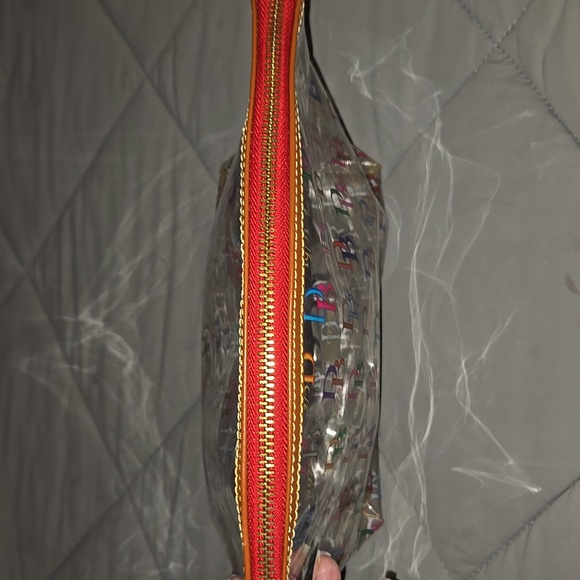 Dooney & Bourke "It On the Go" clear acrylic/PVC cosmetic case with a multicolor - Picture 3 of 5